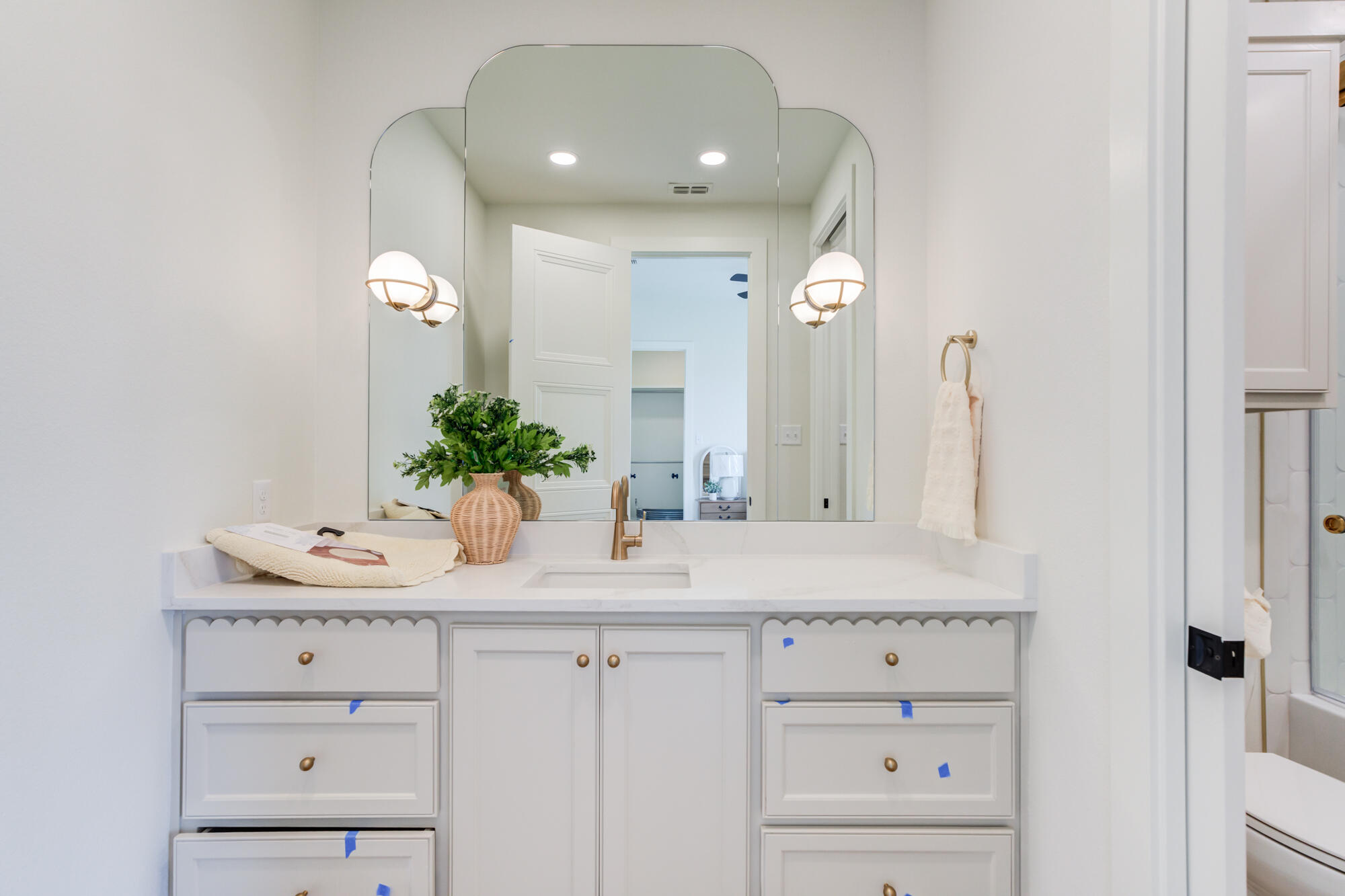 2802 151st Street Lubbock, TX 79423 - Photo 40 of 60 a bathroom with a sink and a mirror
