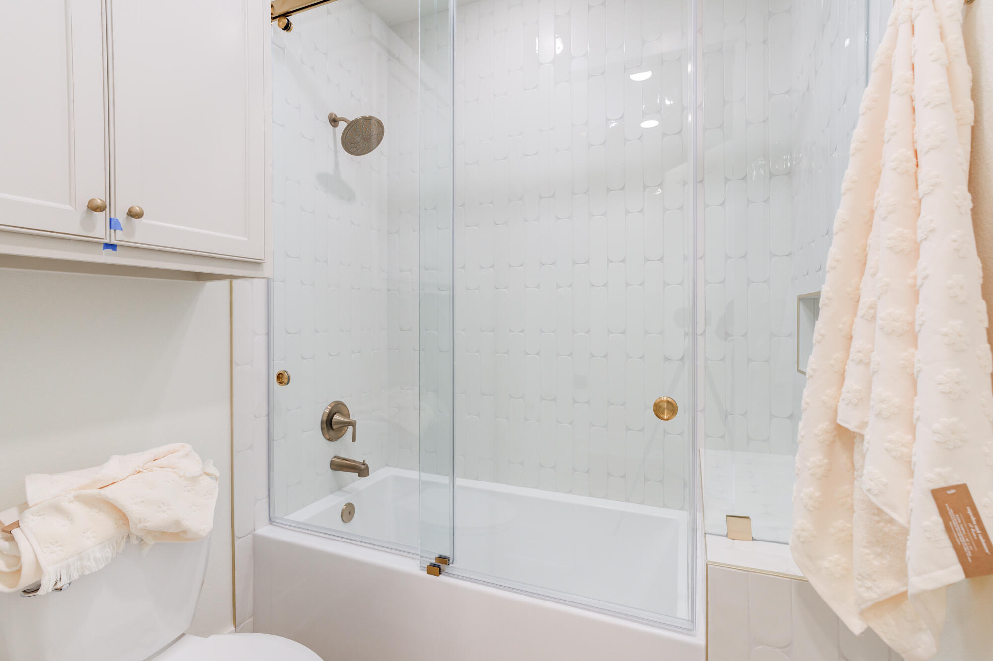 2802 151st Street Lubbock, TX 79423 - Photo 41 of 60 a bathroom with a bathtub and a shower