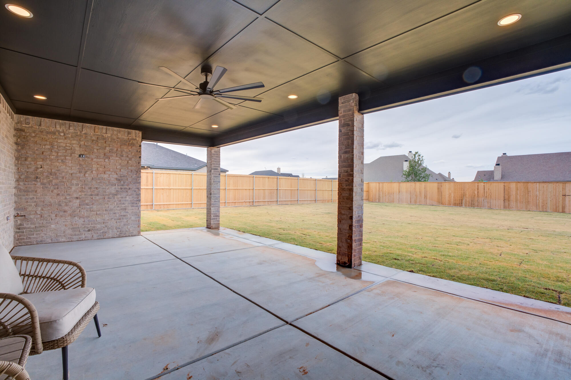 2802 151st Street Lubbock, TX 79423 - Photo 59 of 60 a view of a room with a floor to ceiling window and an outdoor space