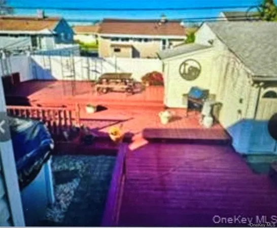 a view of a swimming pool with a patio and couch
