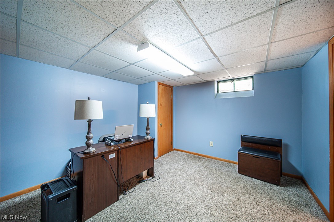 34505 Cannon Road Solon, OH 44139 - Photo 18 of 34 Home office with a drop ceiling and light carpet