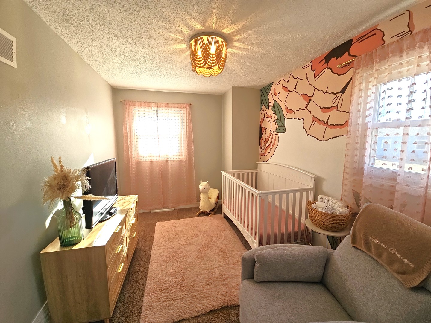 1322 Calvin Street Davenport, IA 52804 - Photo 10 of 25 a living room with furniture and a window