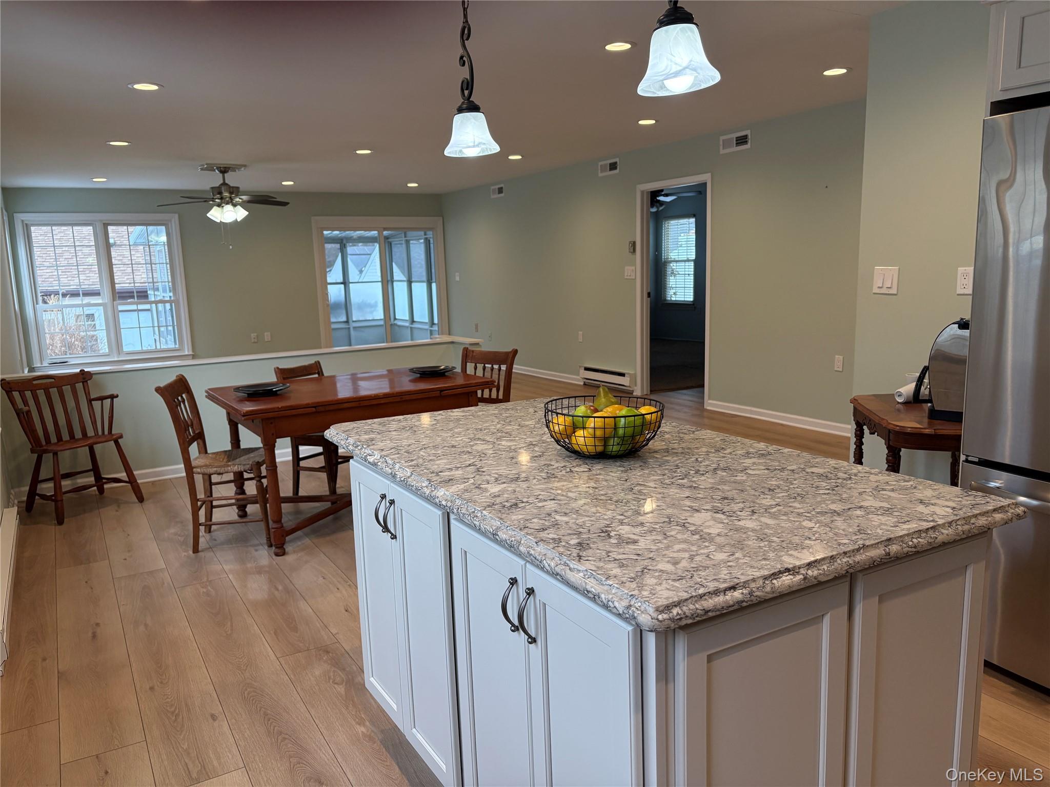 498 Cranston Lane Ridge, NY 11961 - Photo 6 of 30 Unobstructed view to dining and living room