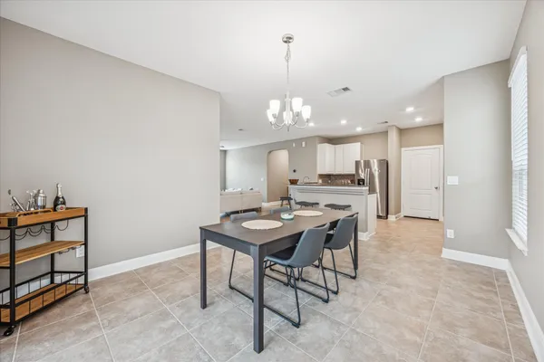 a view of a kitchen and a dining room