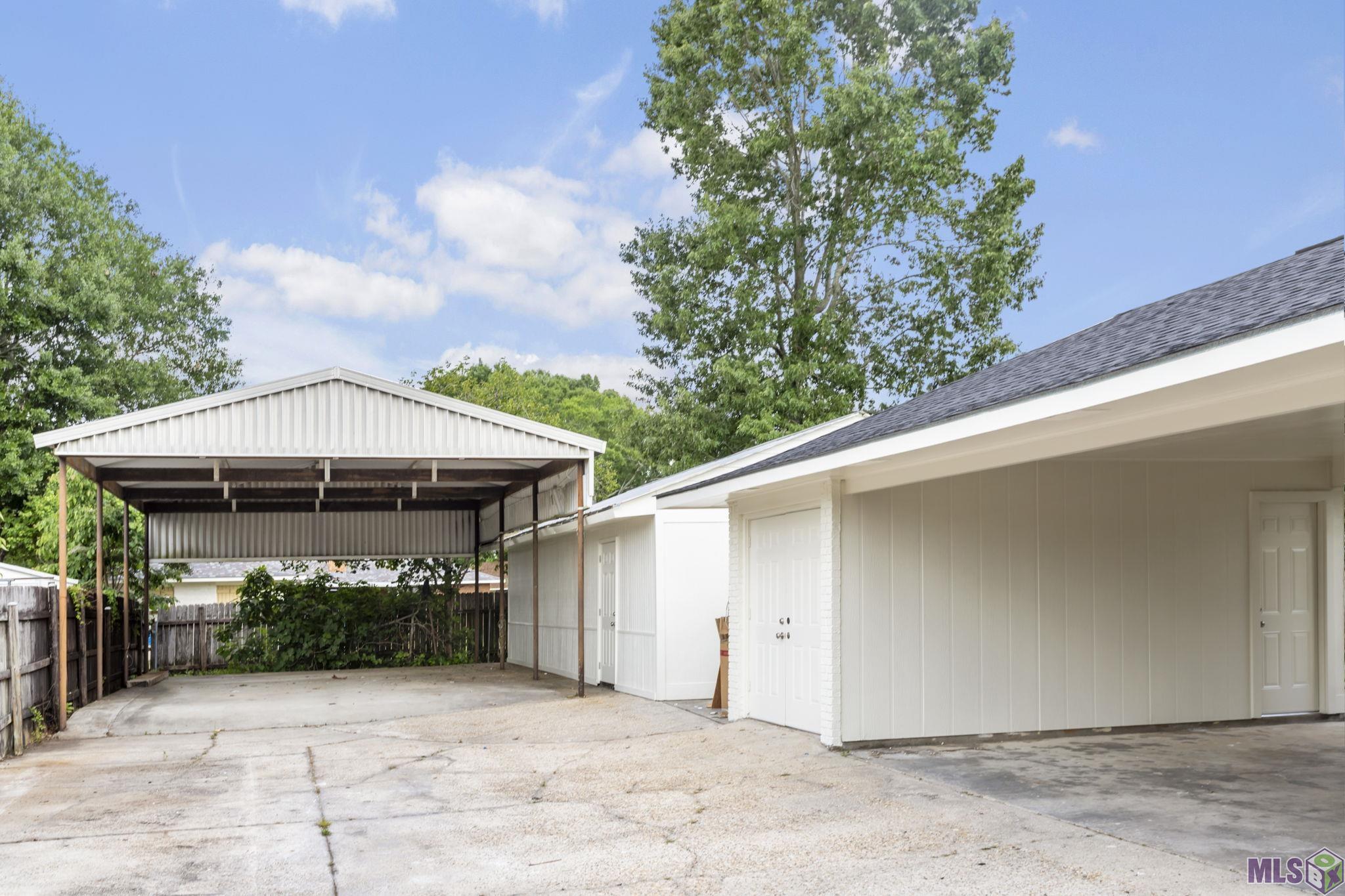 13542 Ridgeview Drive Baton Rouge, LA 70817 - Photo 6 of 18 RV cover and workshop