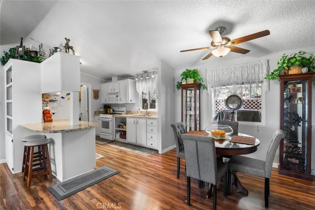 a kitchen with a sink cabinets and window