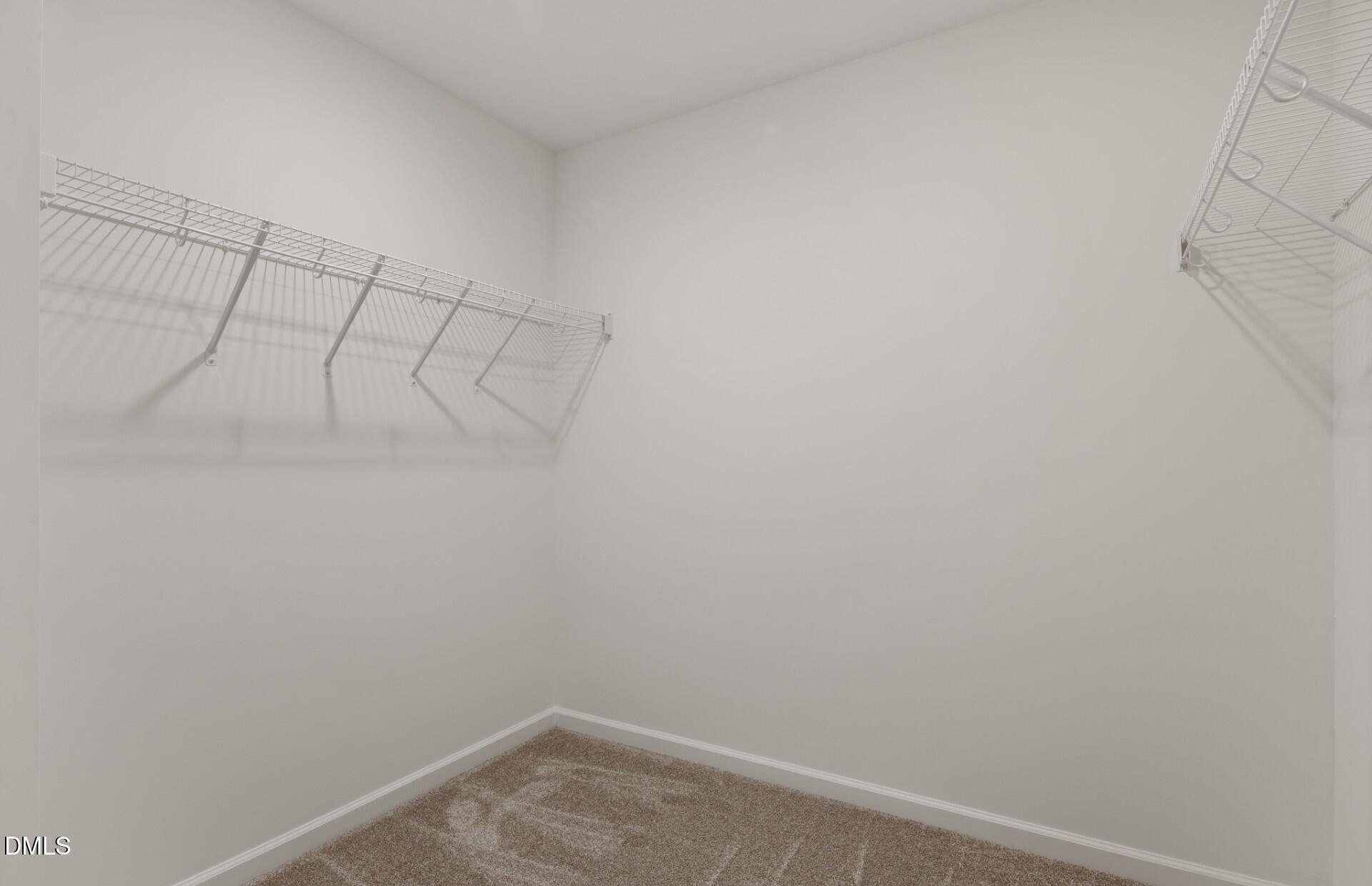 605 Timber Terrace Drive Durham, NC 27704 - Photo 20 of 31 a room with linen closet and dryer