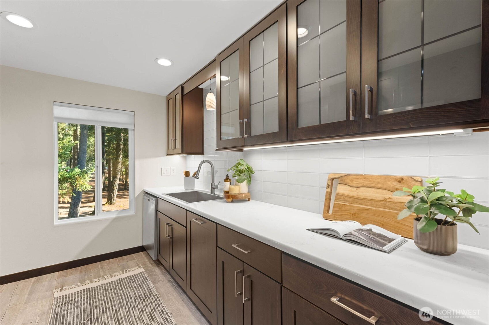 8641 Zircon Drive Southwest, Unit U3 Lakewood, WA 98498 - Photo 11 of 32 a kitchen with a sink and a window