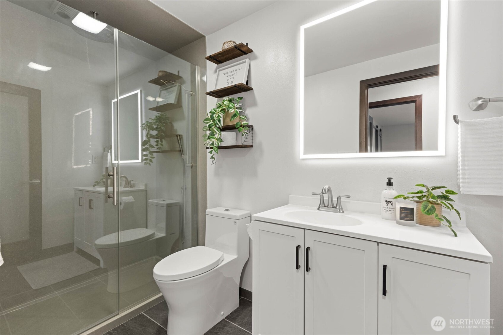 8641 Zircon Drive Southwest, Unit U3 Lakewood, WA 98498 - Photo 15 of 32 a bathroom with a sink toilet and shower