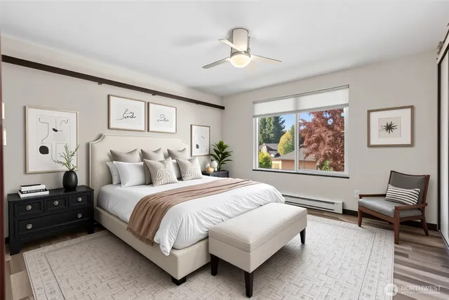 a spacious bedroom with a bed and a couch