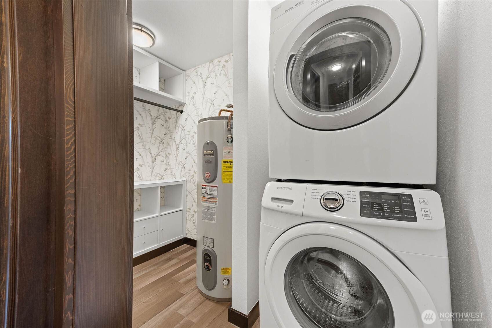8641 Zircon Drive Southwest, Unit U3 Lakewood, WA 98498 - Photo 22 of 32 a view of a hallway with washer and dryer