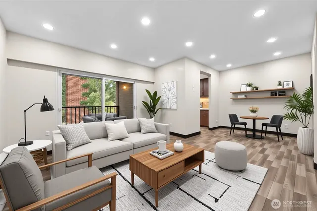 a living room with furniture and a table