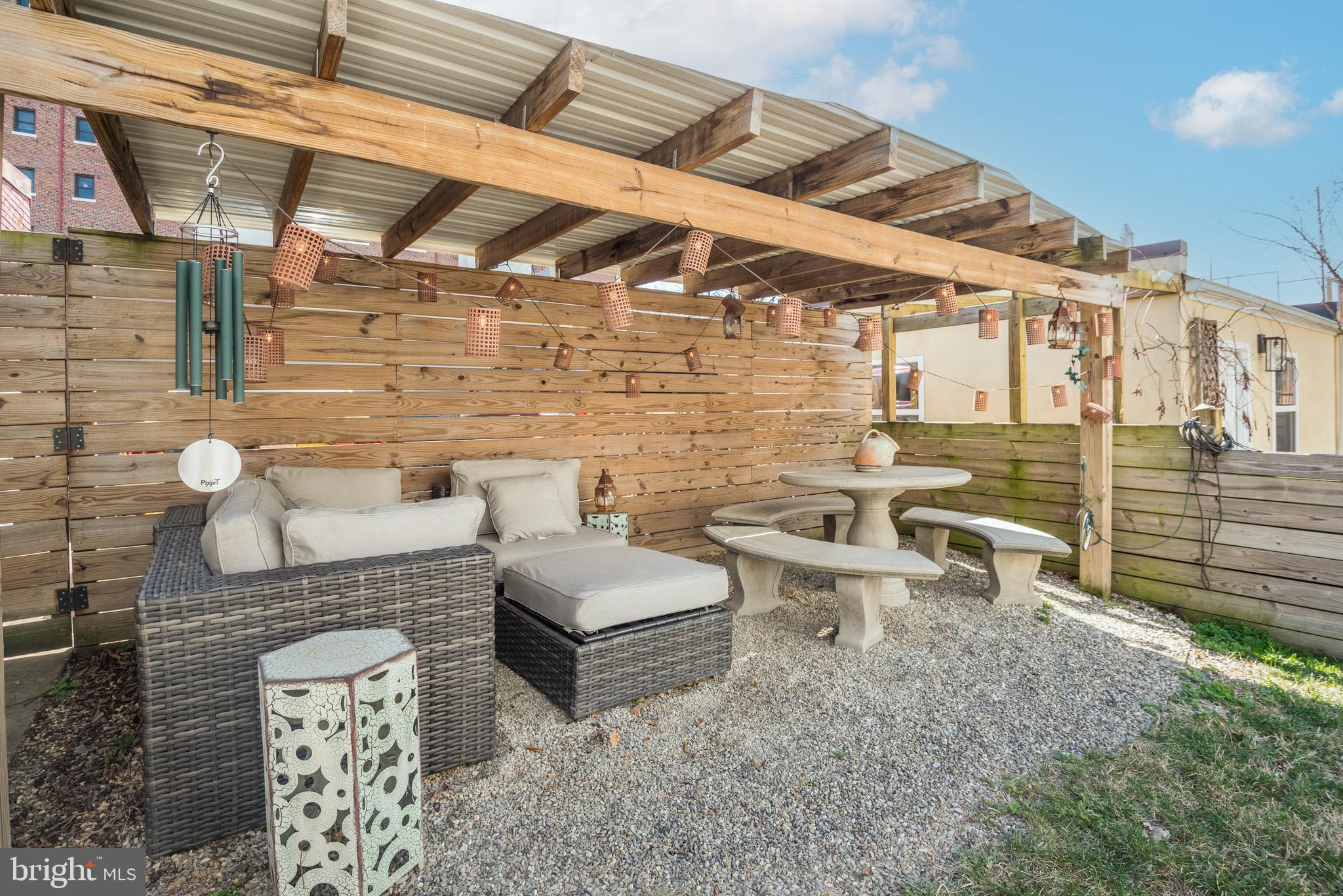 1428 Shepherd Street Northwest, Unit 1 Washington, DC 20011 - Photo 36 of 48 a balcony with chairs and white table