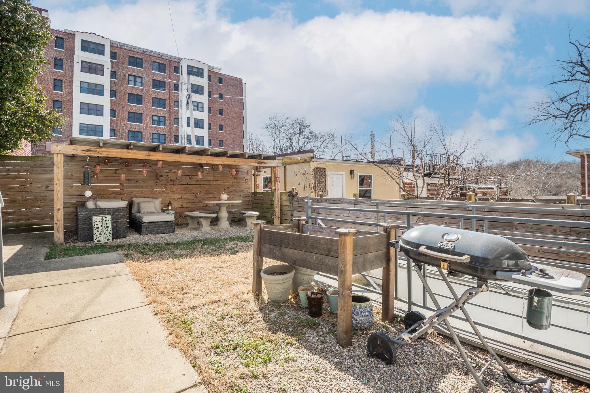 1428 Shepherd Street Northwest, Unit 1 Washington, DC 20011 - Photo 39 of 48 a view of a chairs and table in a patio