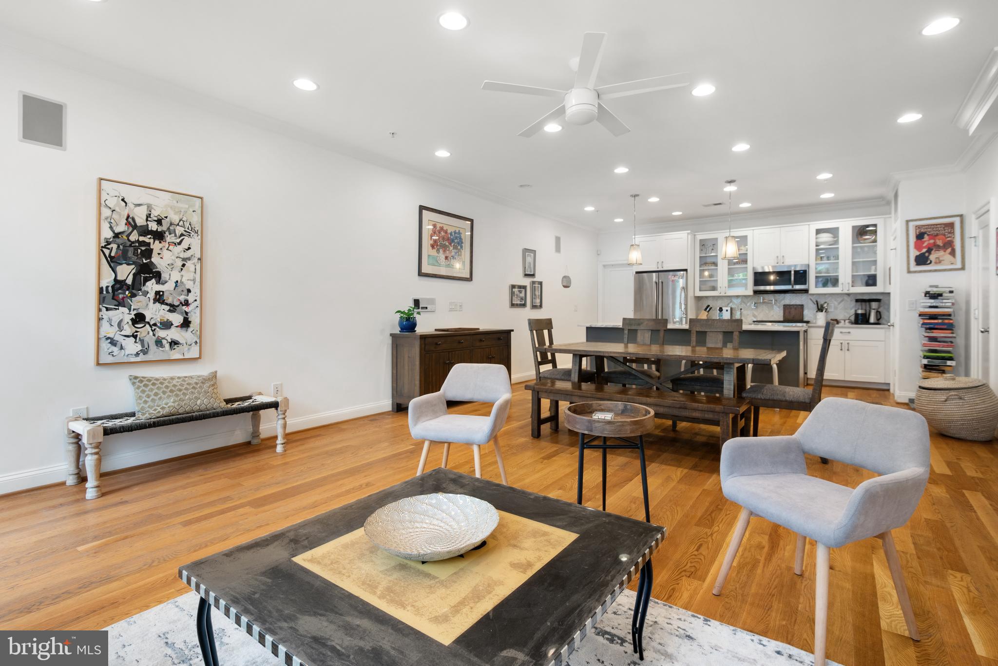 1428 Shepherd Street Northwest, Unit 1 Washington, DC 20011 - Photo 6 of 48 a living room with furniture kitchen view and a table