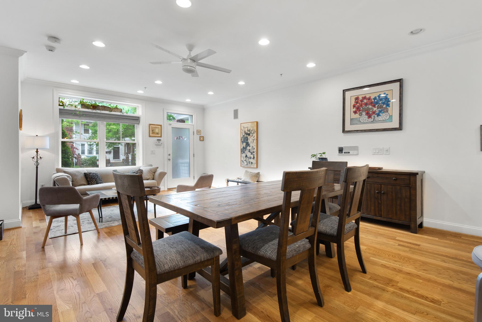 1428 Shepherd Street Northwest, Unit 1 Washington, DC 20011 - Photo 7 of 48 a view of a dining room with furniture and wooden floor