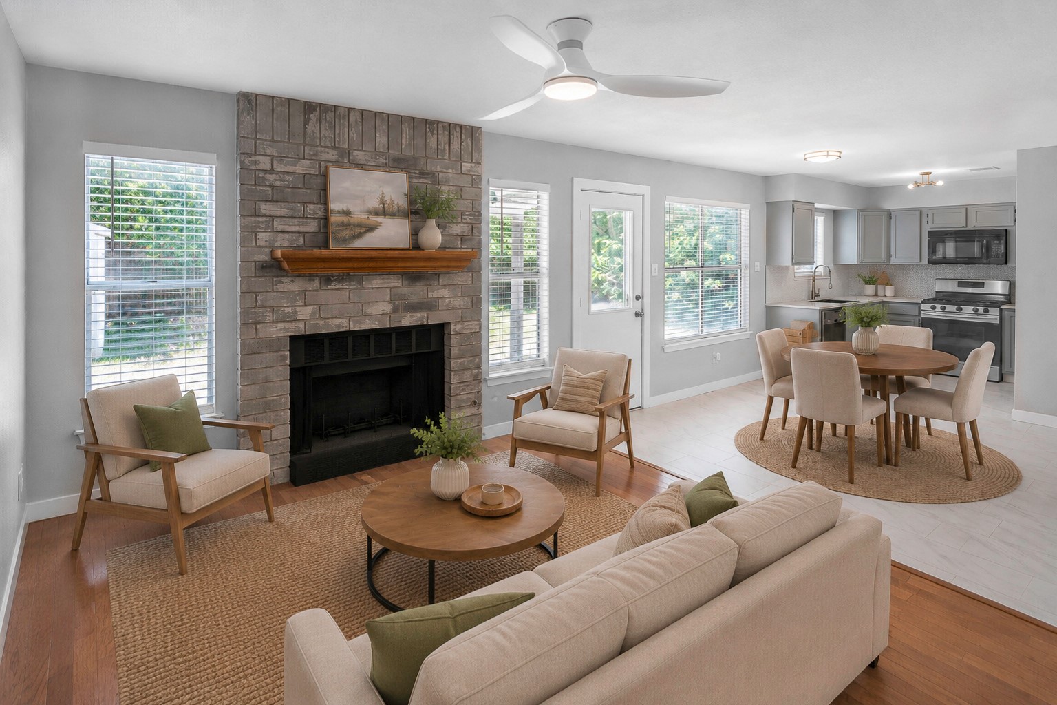 800 Smoke Signal Pass Pflugerville, TX 78660 - Photo 2 of 40 A welcoming living area flows into a functional kitchen, creating an ideal space for entertaining.