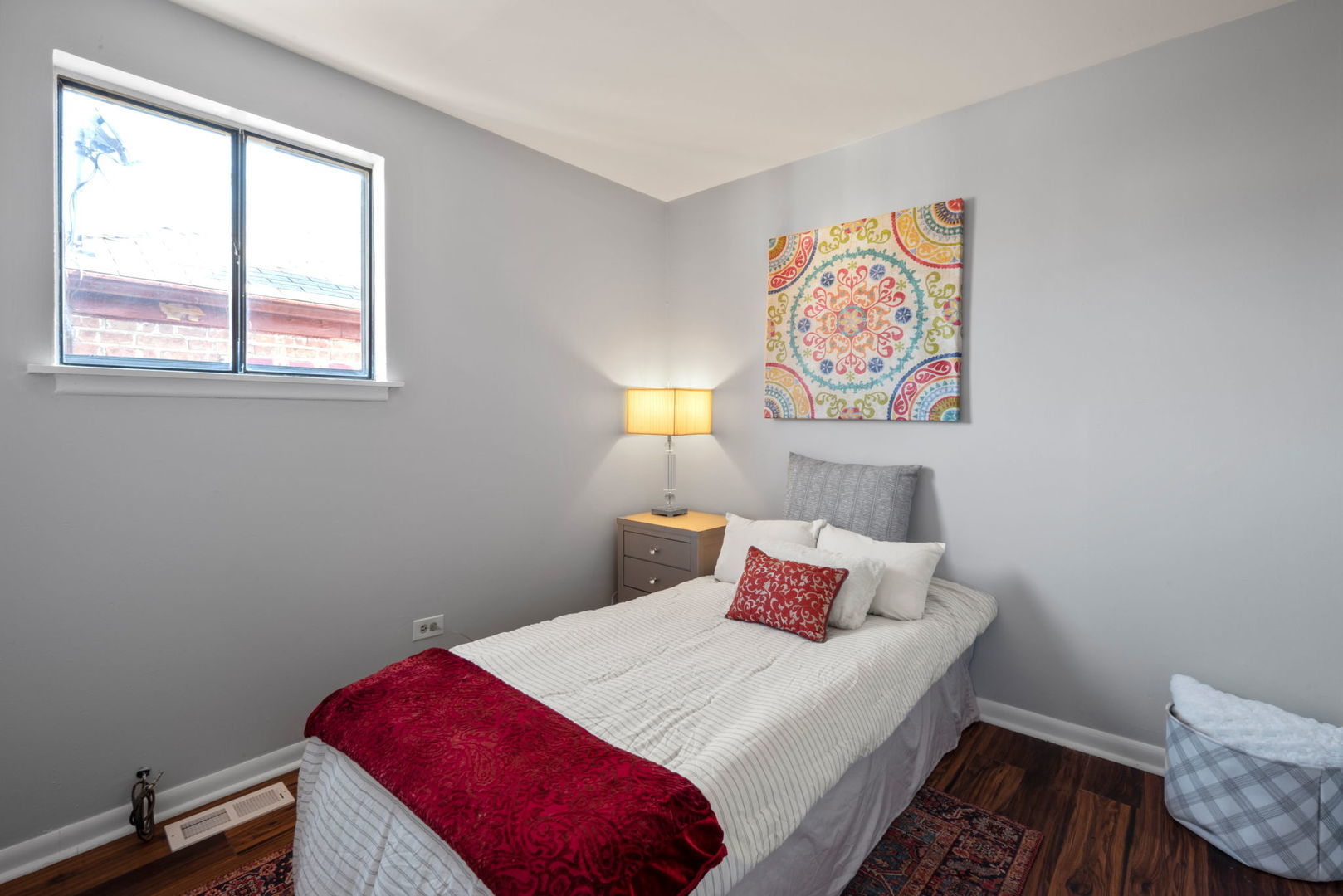 2102 West 73rd Street Chicago, IL 60636 - Photo 15 of 20 a bedroom with a bed and a window