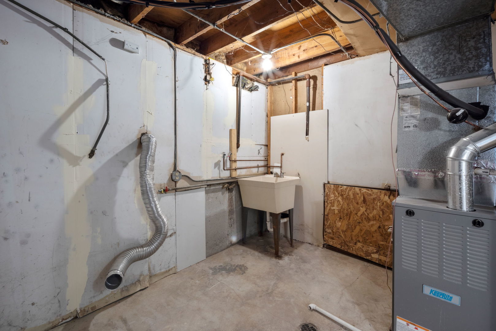 2102 West 73rd Street Chicago, IL 60636 - Photo 16 of 20 a view of walk in closet with clothes and shoes