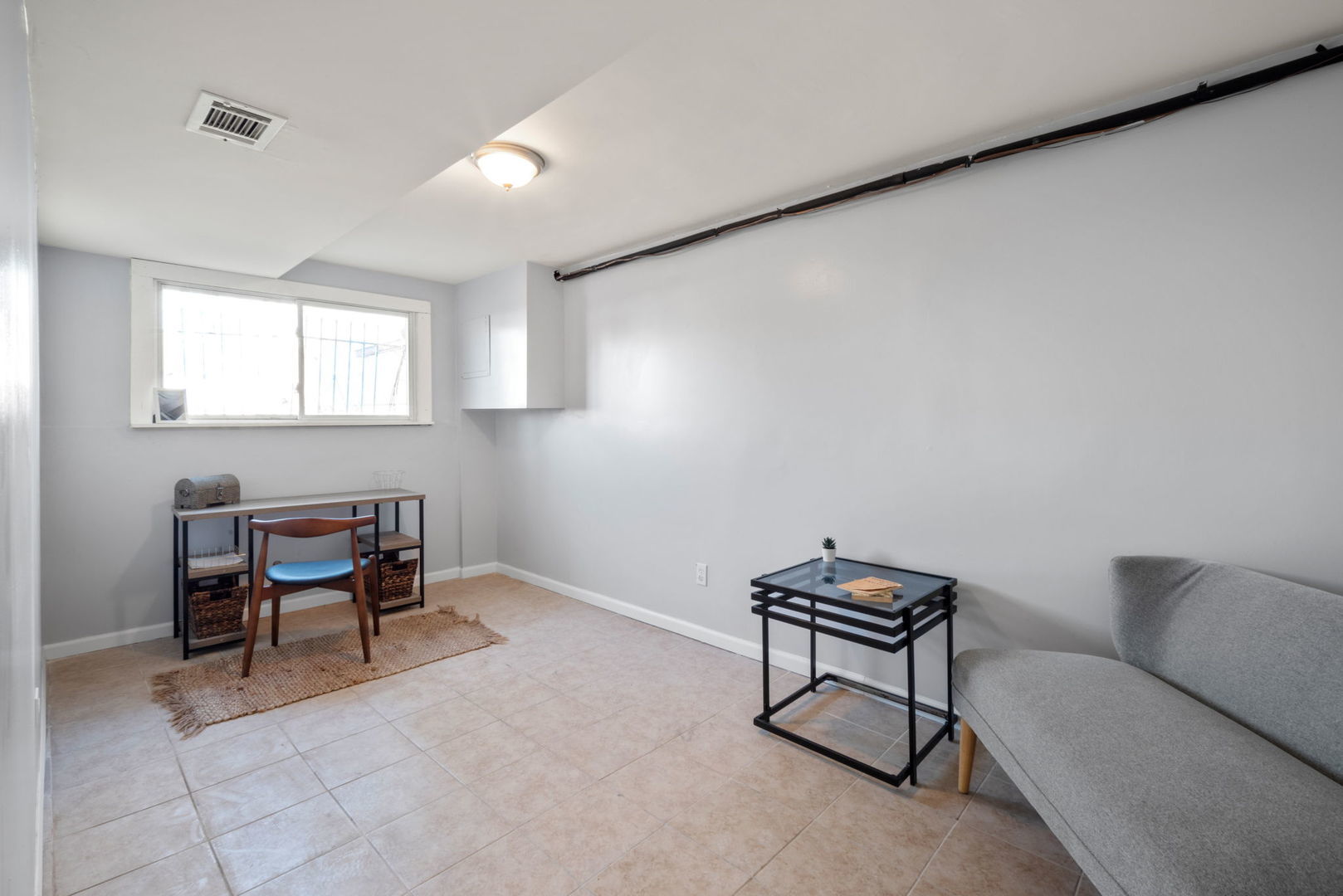 2102 West 73rd Street Chicago, IL 60636 - Photo 19 of 20 a living room with furniture and a piano