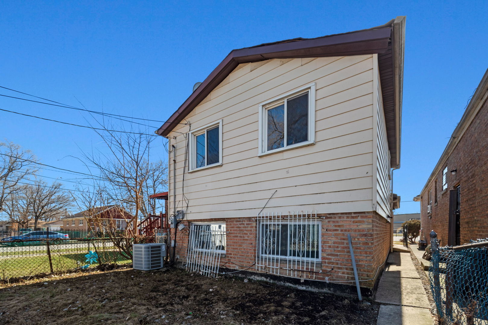 2102 West 73rd Street Chicago, IL 60636 - Photo 4 of 20 a view of a house with a yard