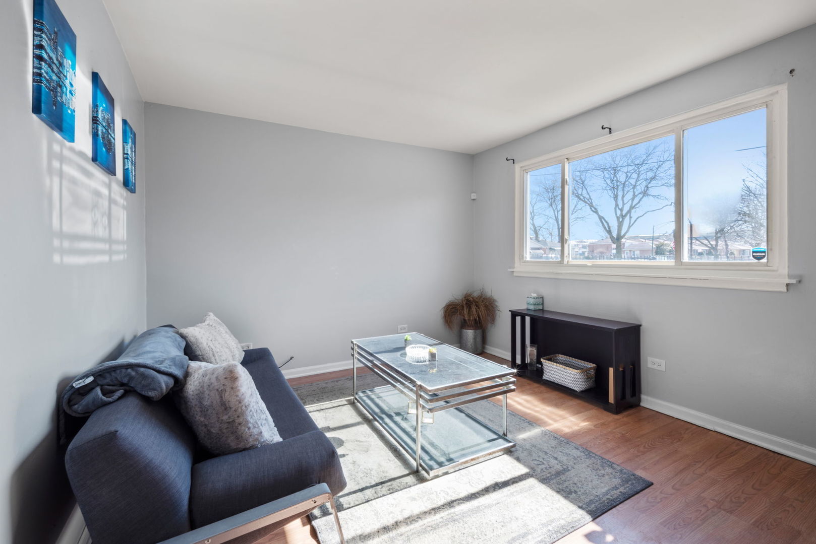 2102 West 73rd Street Chicago, IL 60636 - Photo 6 of 20 a living room with furniture and a window