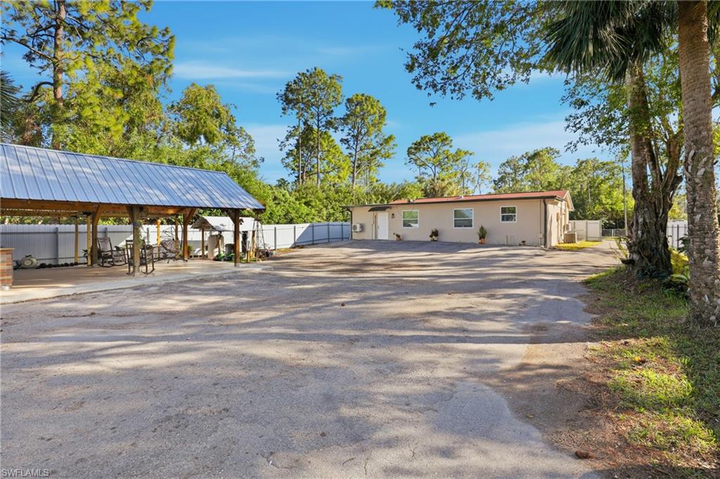 6005 Star Grass Lane Naples, FL 34116 - Photo 31 of 44 View of side of property