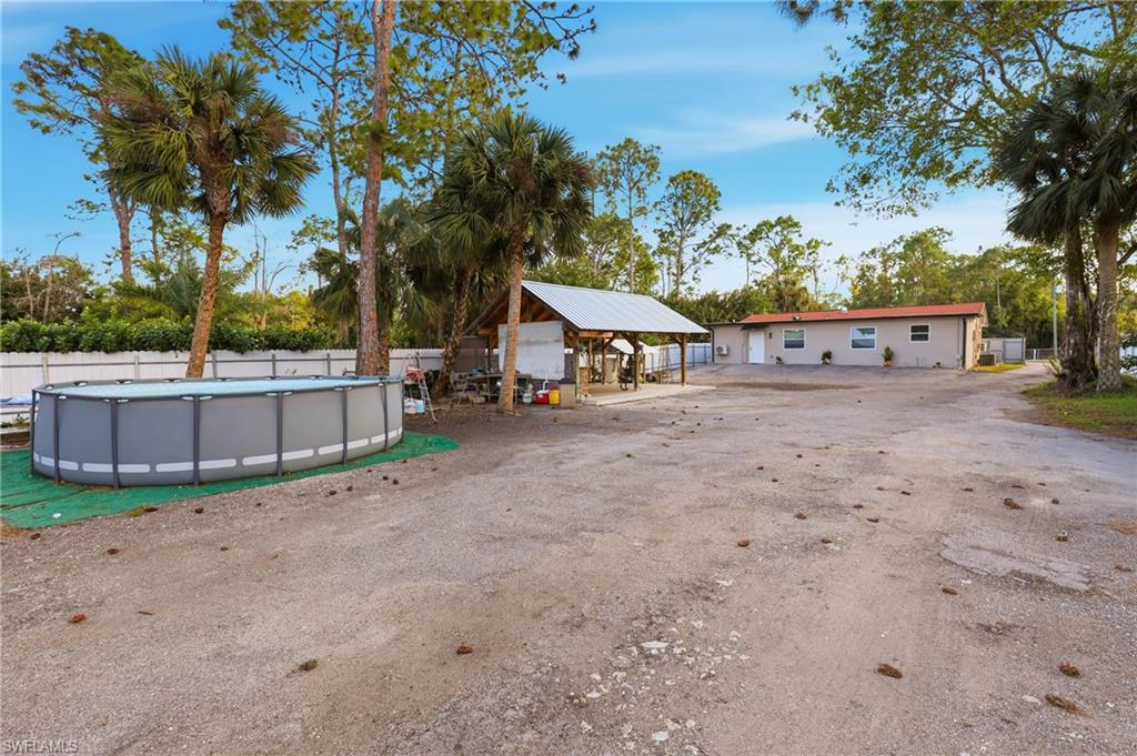 6005 Star Grass Lane Naples, FL 34116 - Photo 33 of 44 View of yard