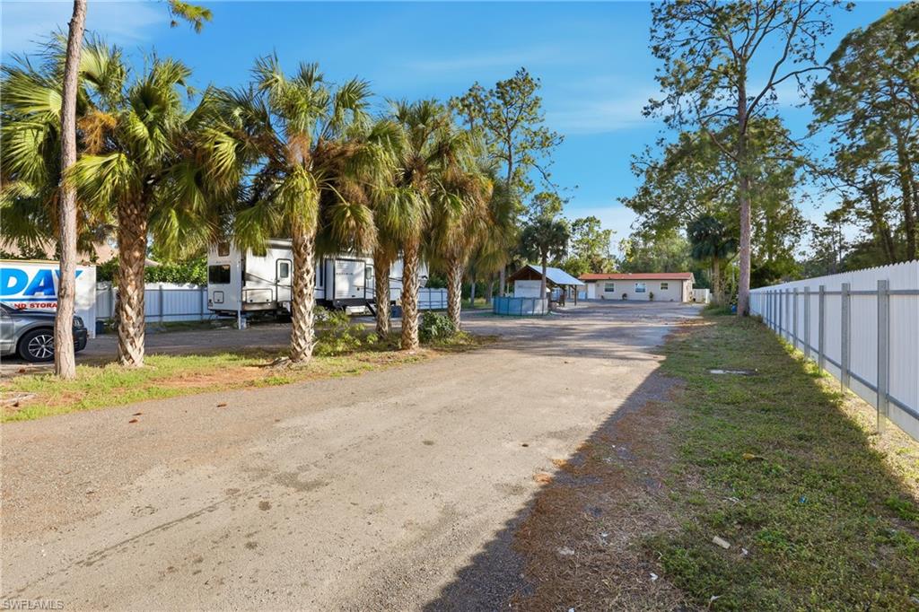 6005 Star Grass Lane Naples, FL 34116 - Photo 37 of 44 View of asphalt road