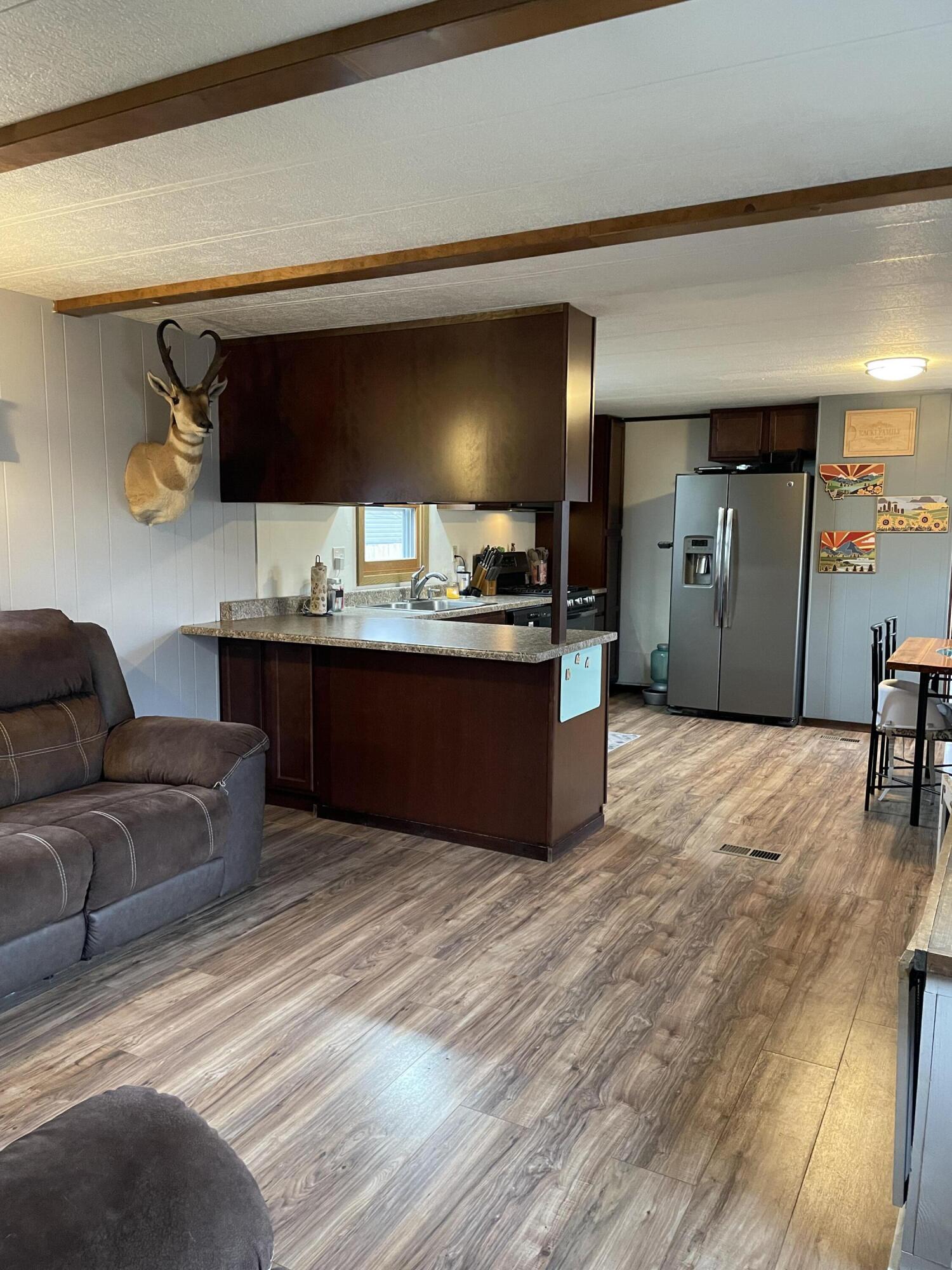 1511 Mydland Road, Unit 185 Sheridan, WY 82801 - Photo 3 of 18 IMG_9655