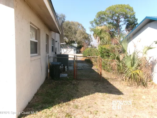 a view of a porch with a yard