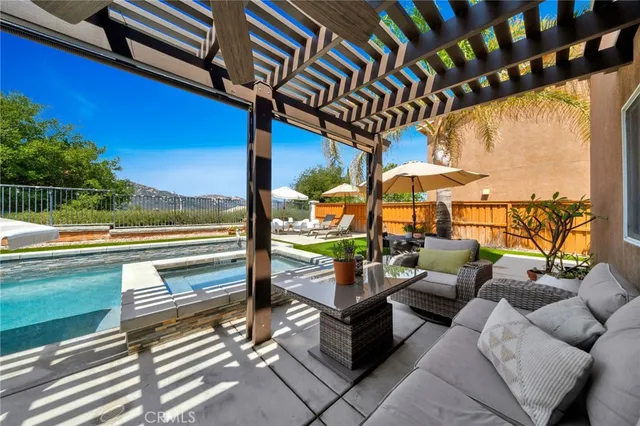 a view of a livingroom with furniture and a gate