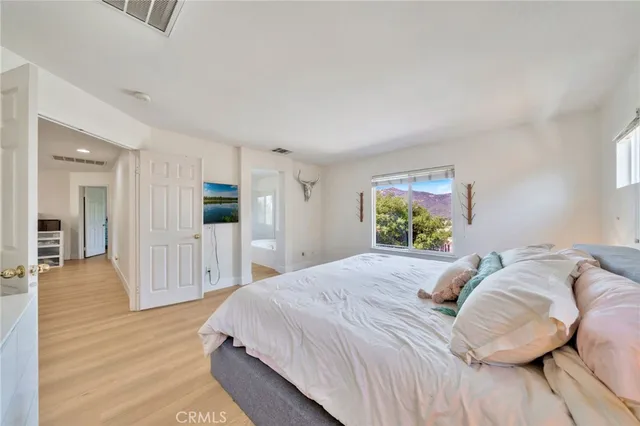 a bathroom with a sink vanity and mirror