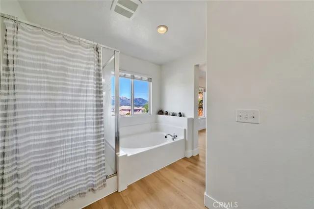 a bedroom with a bed furniture and a window