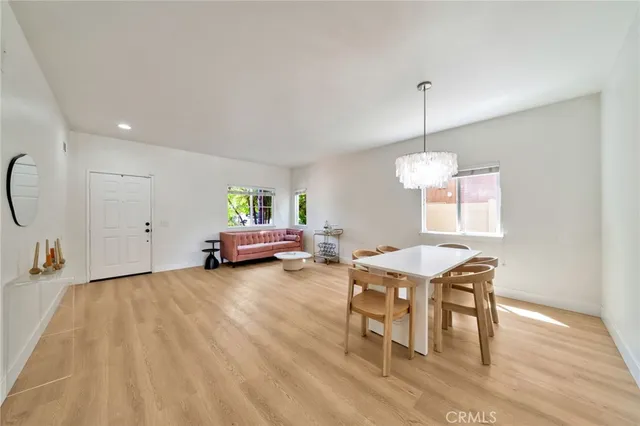 a view of a livingroom with furniture and window