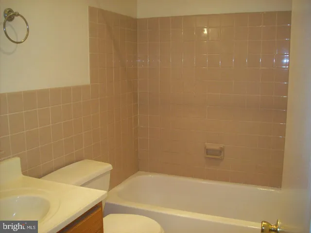 a bathroom with a sink and a bathtub