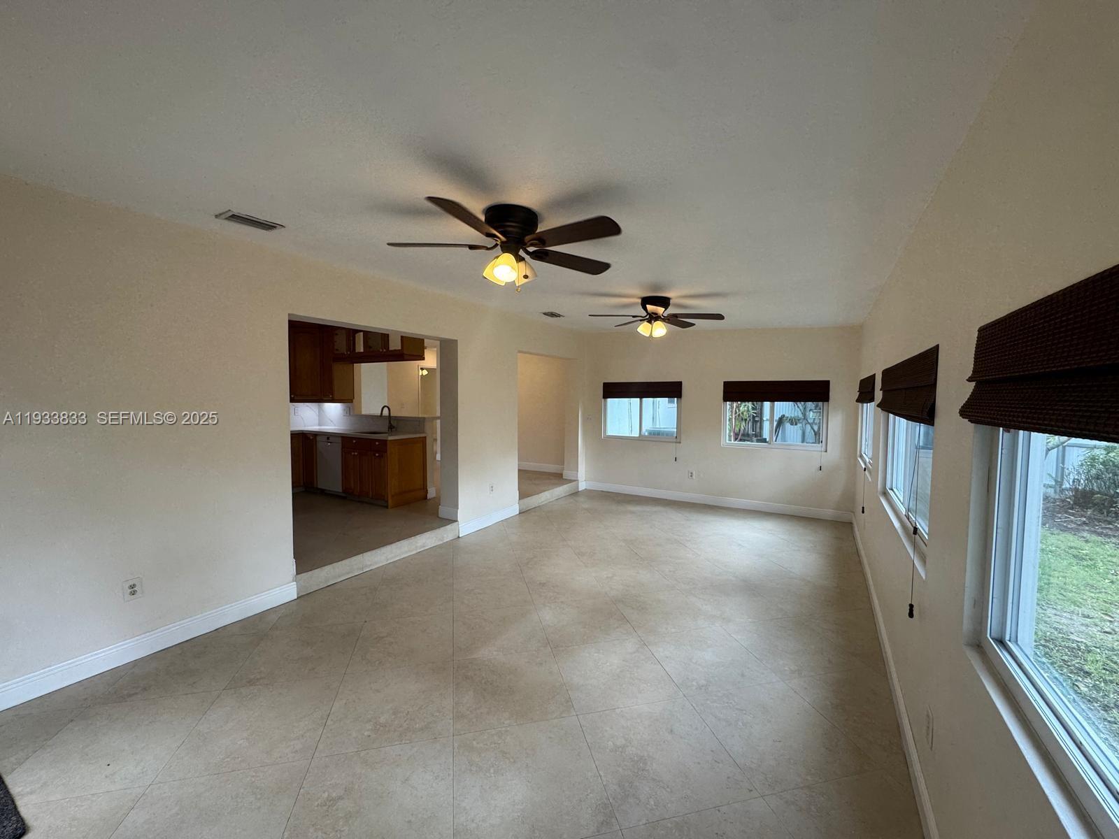 18600 Southwest 97th Avenue Cutler Bay, FL 33157 - Photo 13 of 23 a view of a livingroom with a fireplace