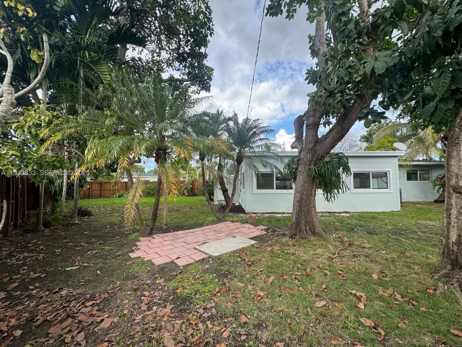 18600 Southwest 97th Avenue Cutler Bay, FL 33157 - Photo 21 of 23 a view of a house with a yard