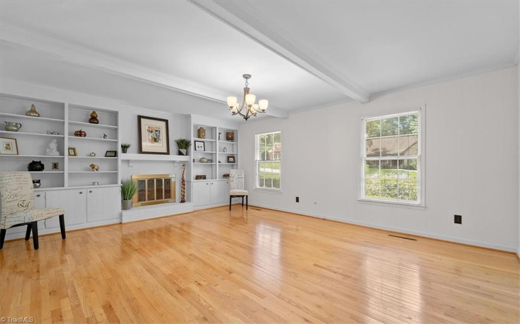 3610 Gramercy Road Greensboro, NC 27410 - Photo 17 of 39 Den with Fireplace