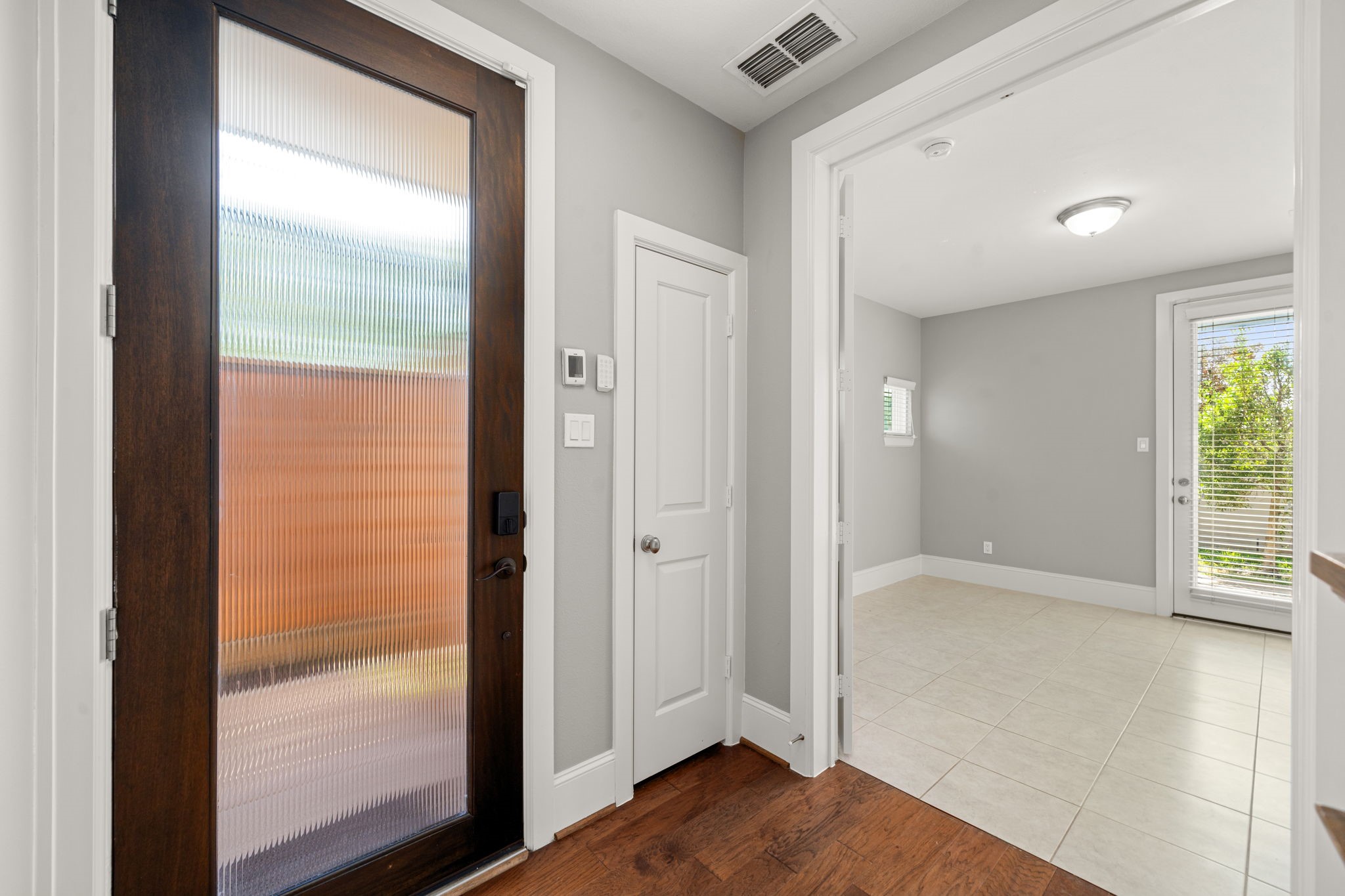 6703 Highclere Manor Lane Houston, TX 77055 - Photo 3 of 36 a view of closet with wooden floor