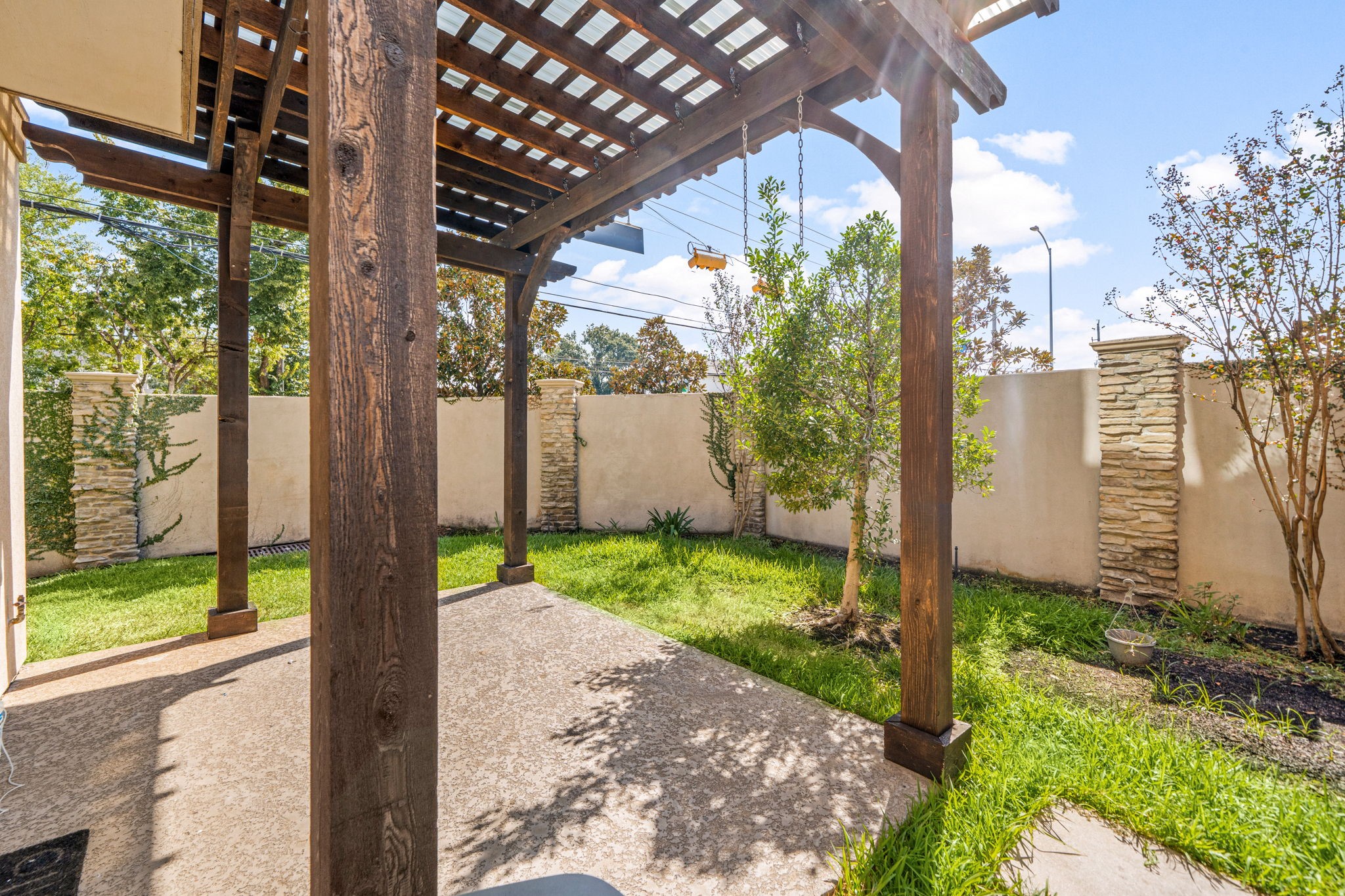 6703 Highclere Manor Lane Houston, TX 77055 - Photo 34 of 36 a view of a back yard from a room