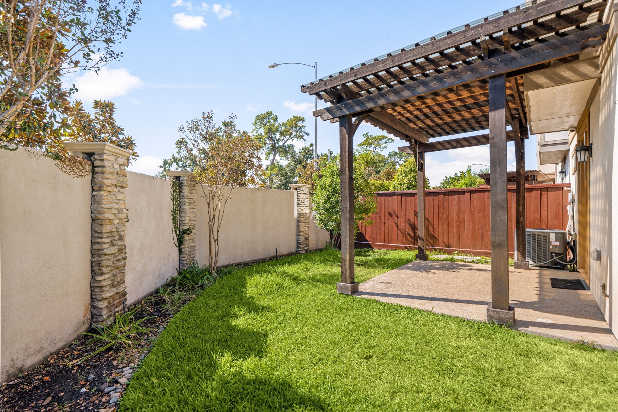 6703 Highclere Manor Lane Houston, TX 77055 - Photo 36 of 36 a view of a backyard
