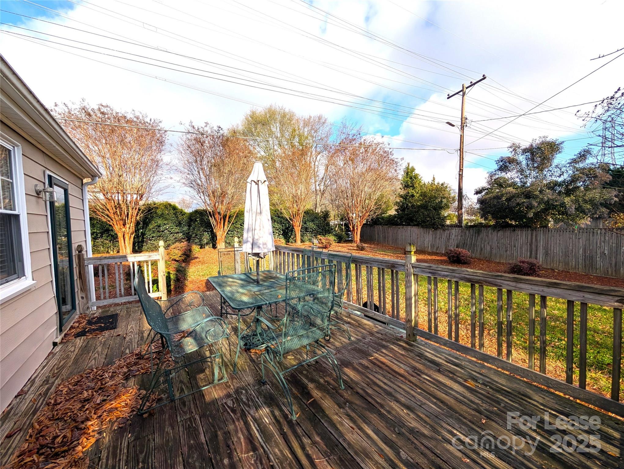 539 Marsh Road Charlotte, NC 28209 - Photo 20 of 23 a view of a balcony with wooden floor