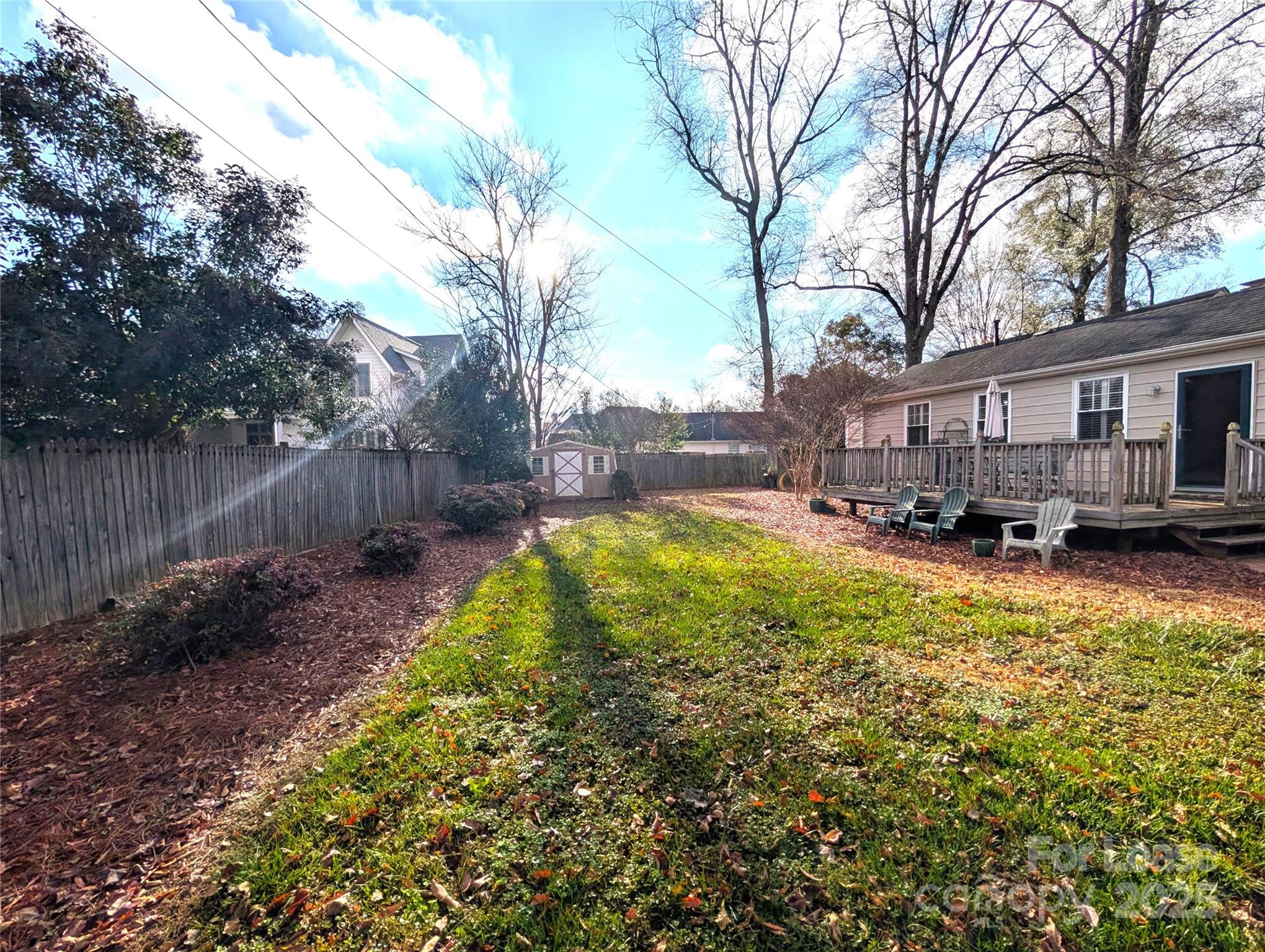 539 Marsh Road Charlotte, NC 28209 - Photo 23 of 23 a view of a backyard with a garden