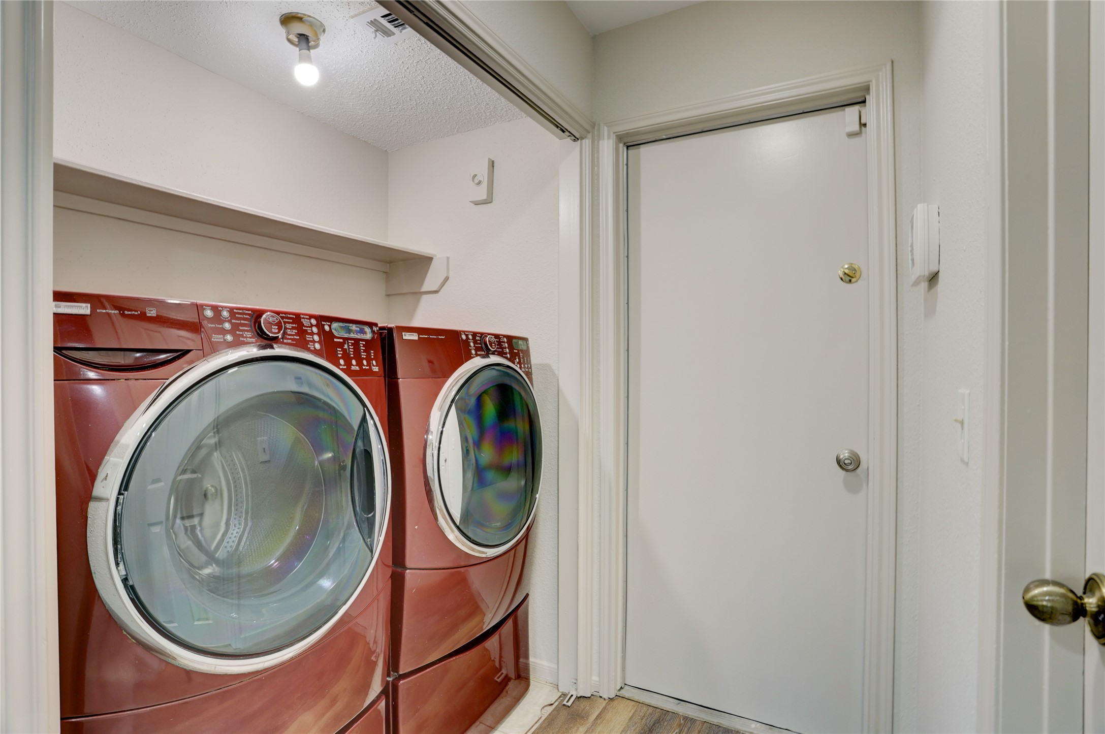 3122 Rimrock Drive Missouri City, TX 77459 - Photo 16 of 29 a utility room with dryer and washer