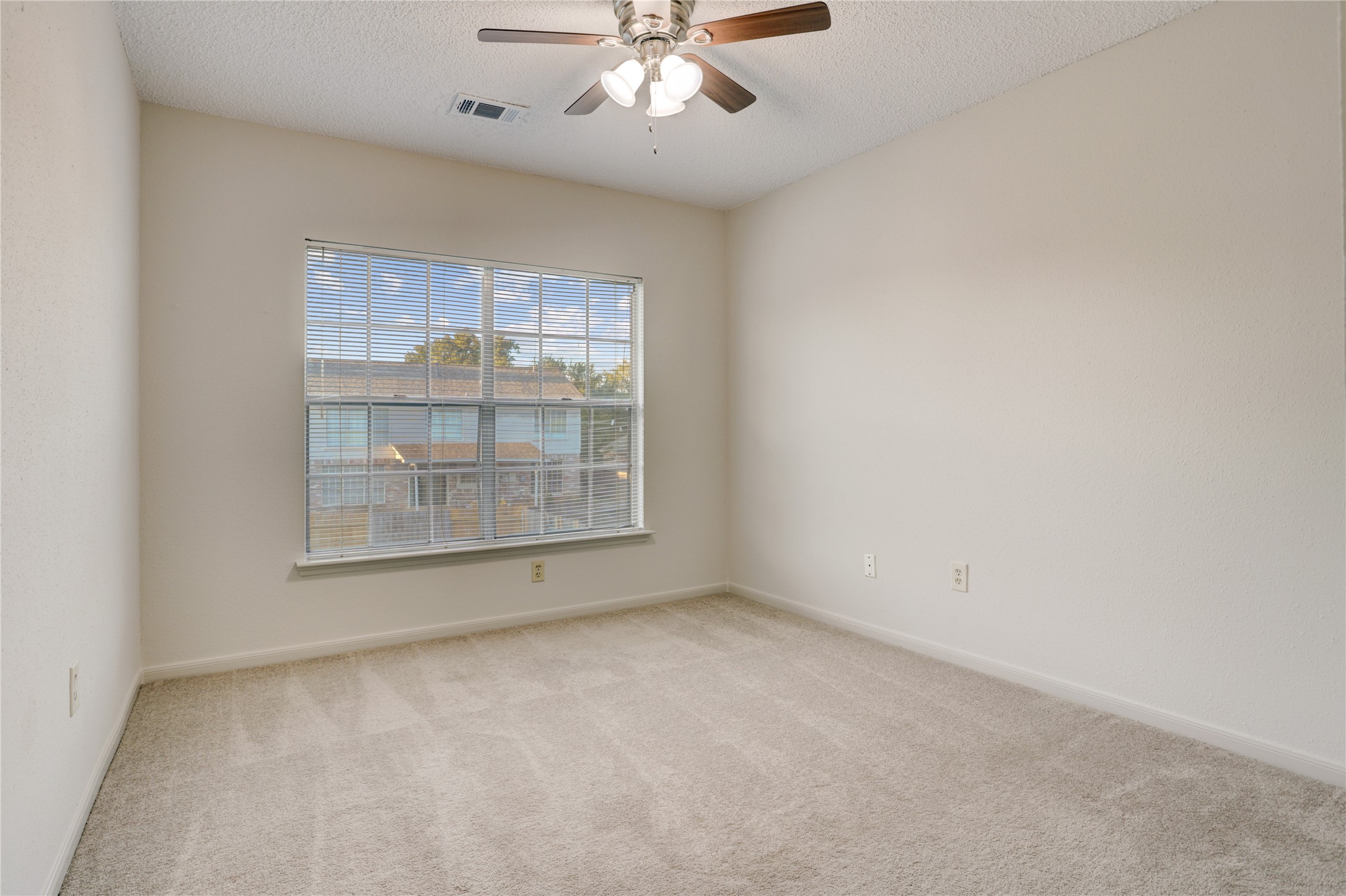 3122 Rimrock Drive Missouri City, TX 77459 - Photo 24 of 29 an empty room with a window