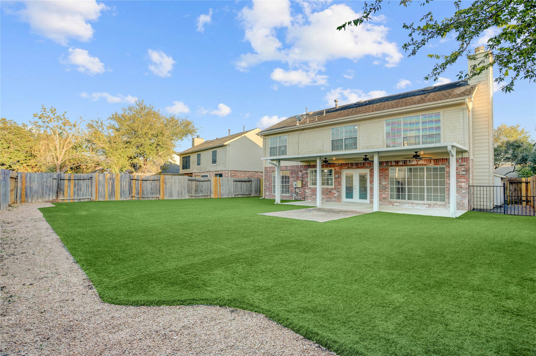 3122 Rimrock Drive Missouri City, TX 77459 - Photo 27 of 29 a view of an house with backyard space and balcony