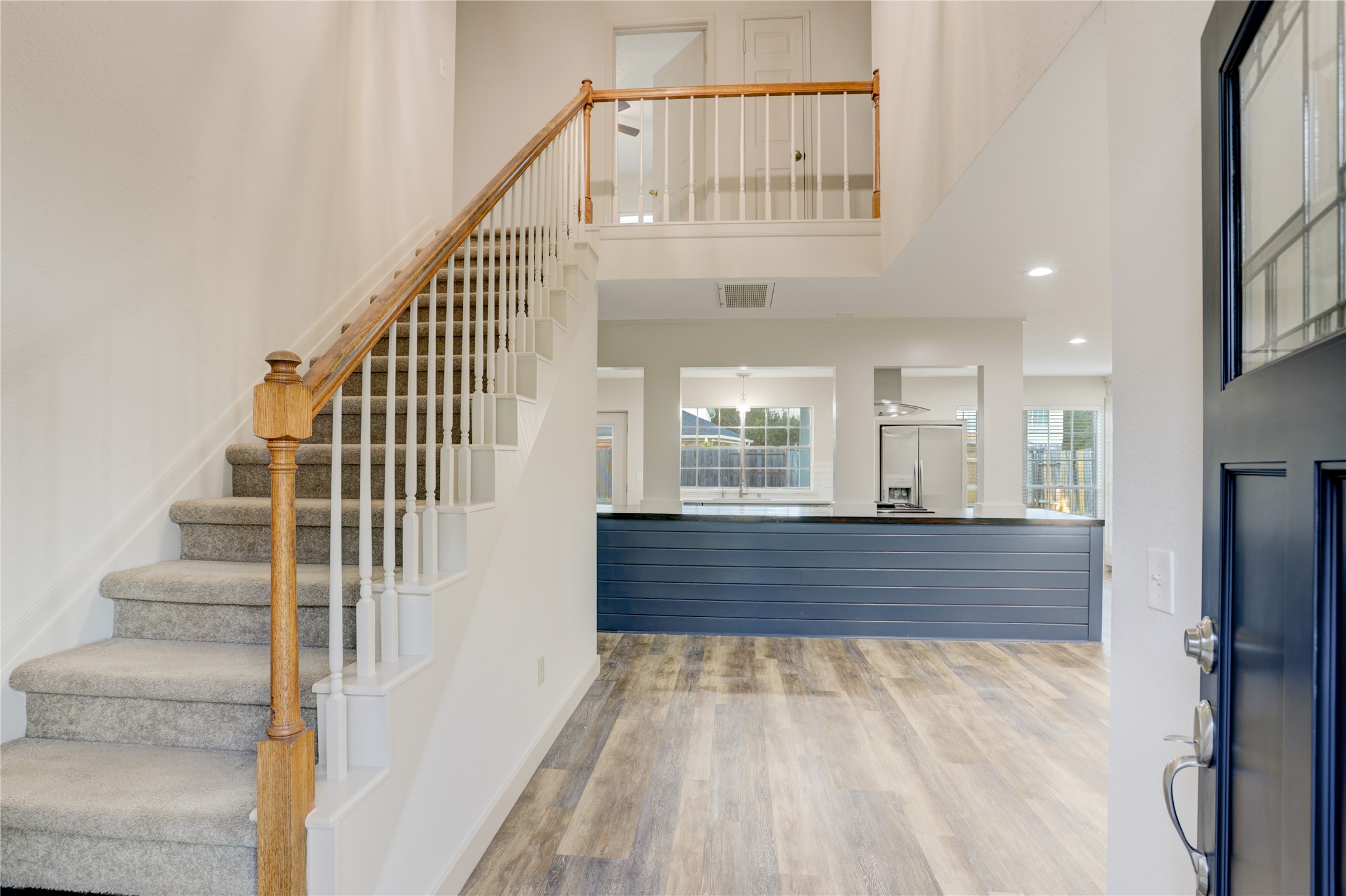 3122 Rimrock Drive Missouri City, TX 77459 - Photo 4 of 29 a view of entryway and hall with wooden floor