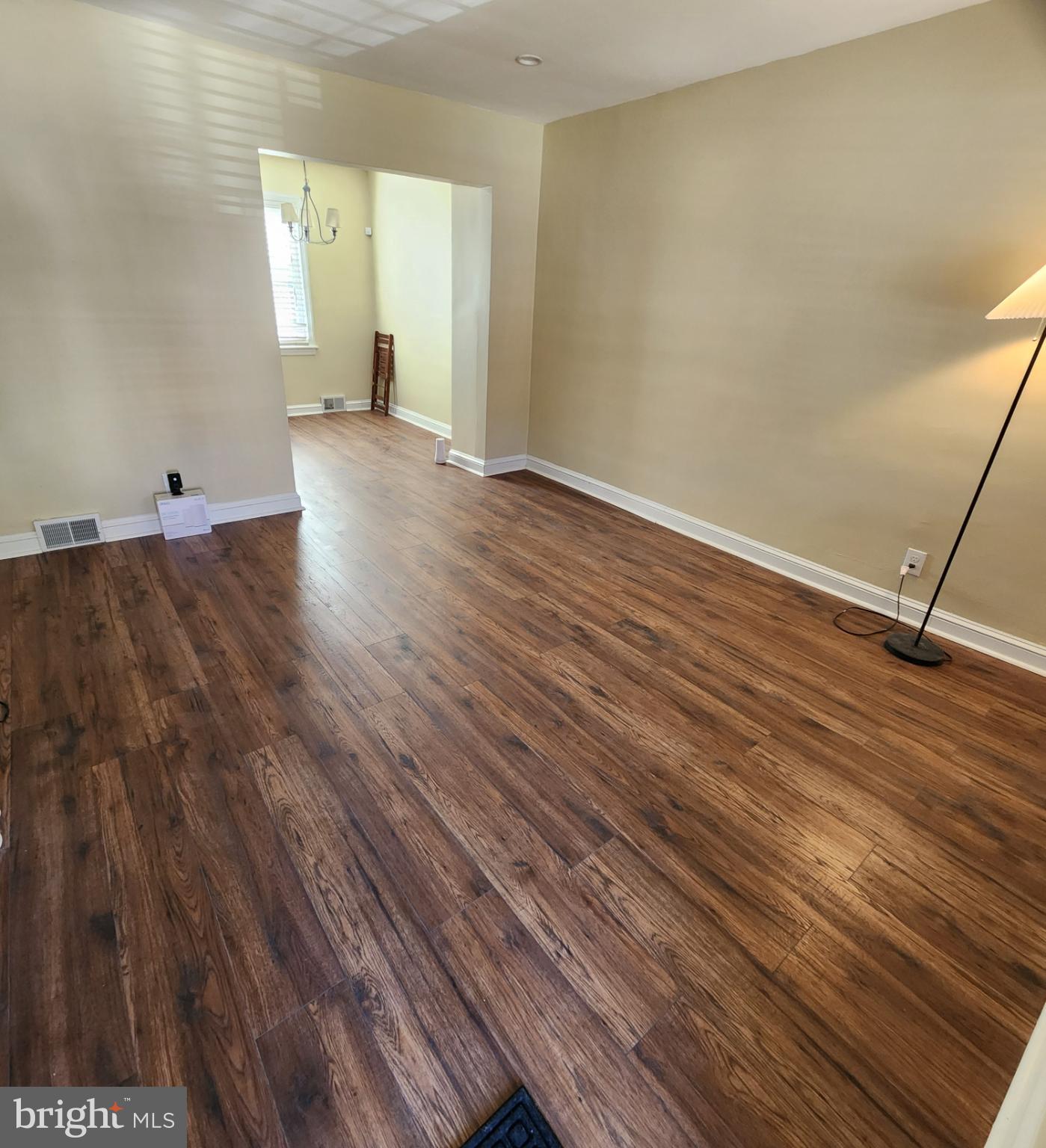 2330 14th Place Southeast Washington, DC 20020 - Photo 3 of 22 a view of a room with wooden floor and window