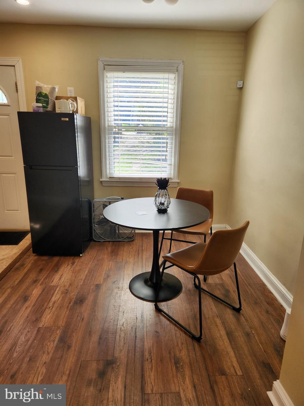 2330 14th Place Southeast Washington, DC 20020 - Photo 6 of 22 a dining room with furniture and wooden floor